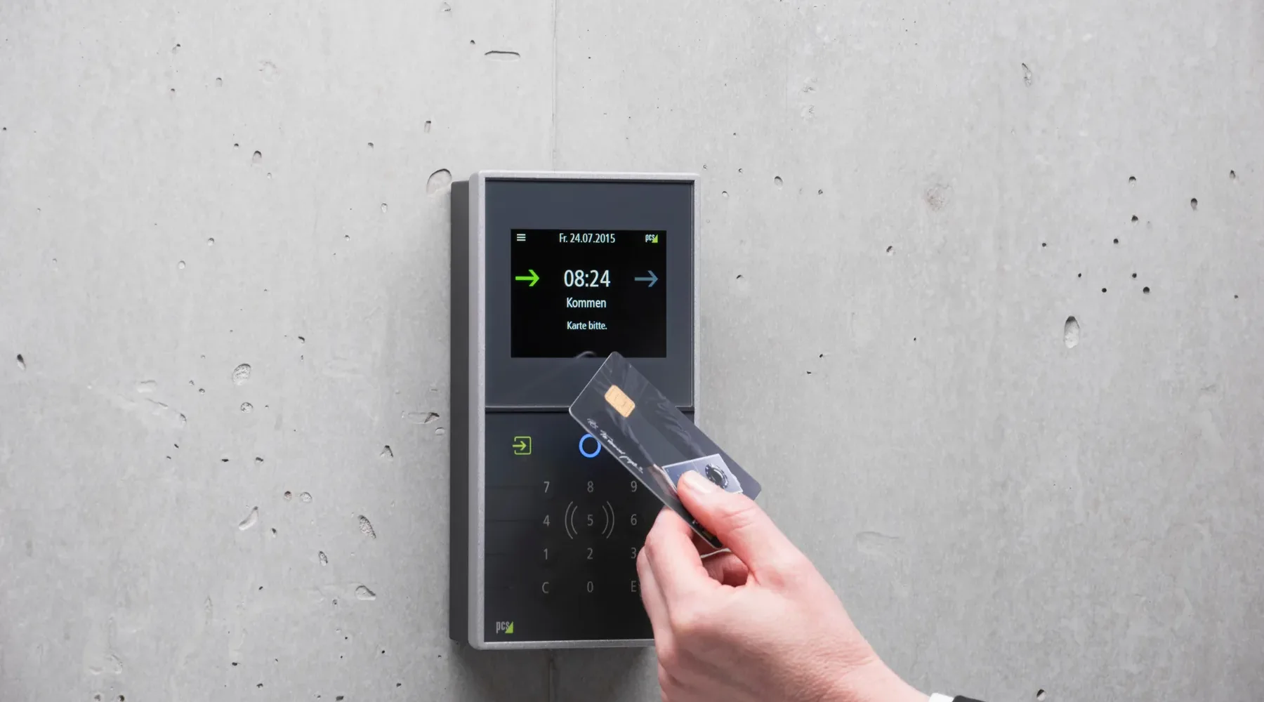 Access card held beside a door reader
